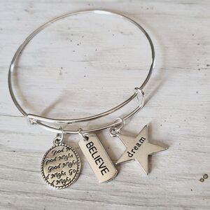 Bracelets by Sandra silver tone adjustable, Believe